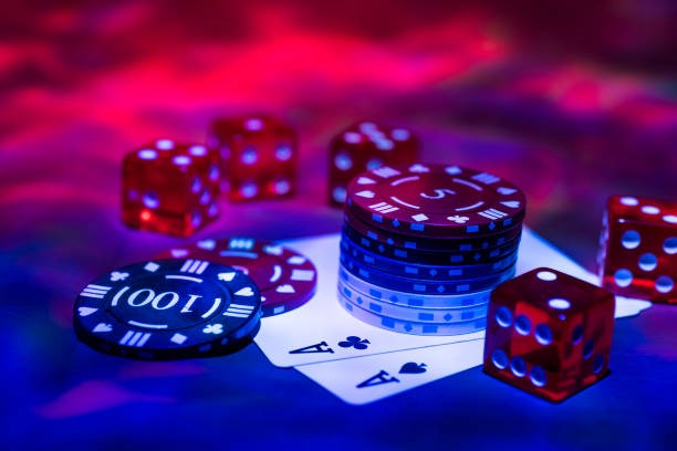Mobile phone screen showing Caribbean Stud Poker table layout with ante and raise bet areas clearly marked